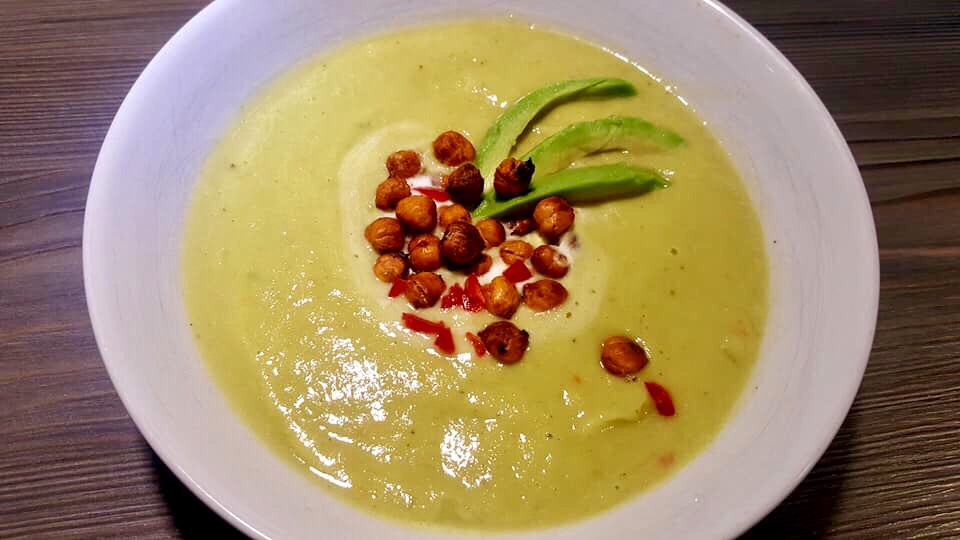 Avocado soup topped with harissa chickpeas