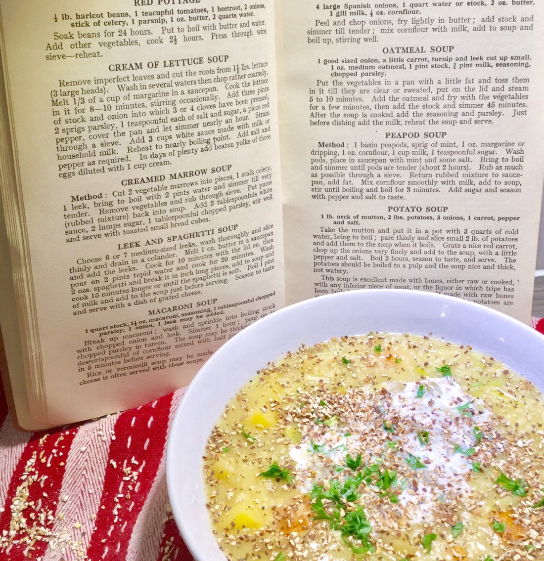 A bowl of oatmeal soup and a recipe book